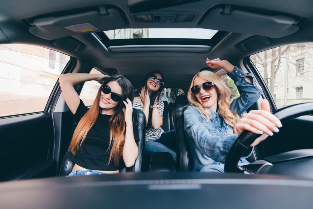 Driving home with party girls image